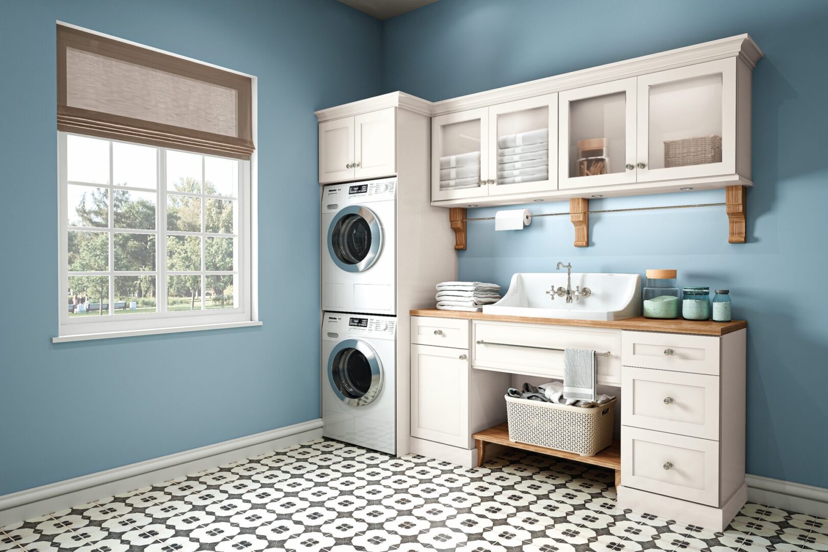 A Laundry Area With Blue Walls and White Cabinets